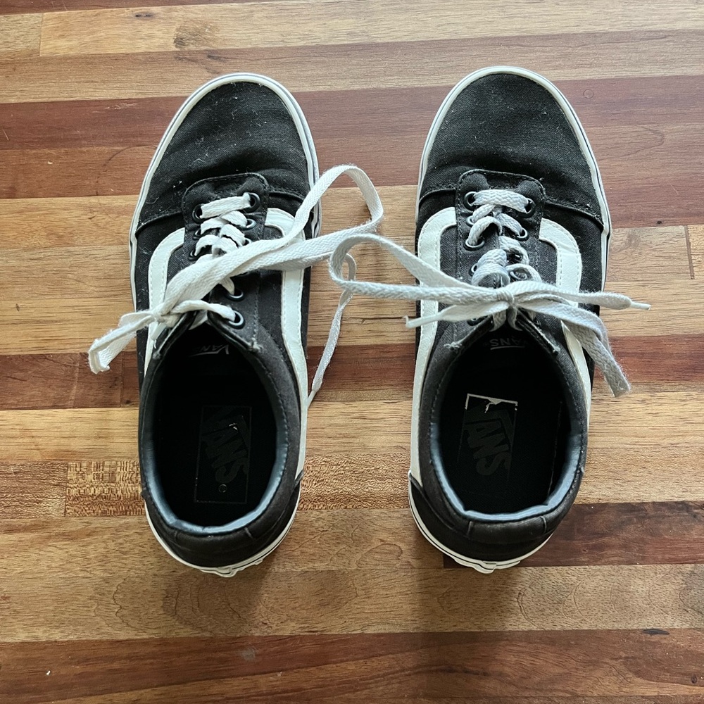 Women’s black vans. Size 7. Excellent condition.